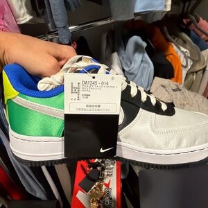 Nike White and Blue Sneakers with Green Accents